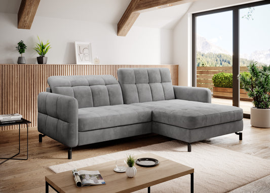 LORELLE Corner Sofa Bed in a modern living room setting with bold color and tasteful quilting.