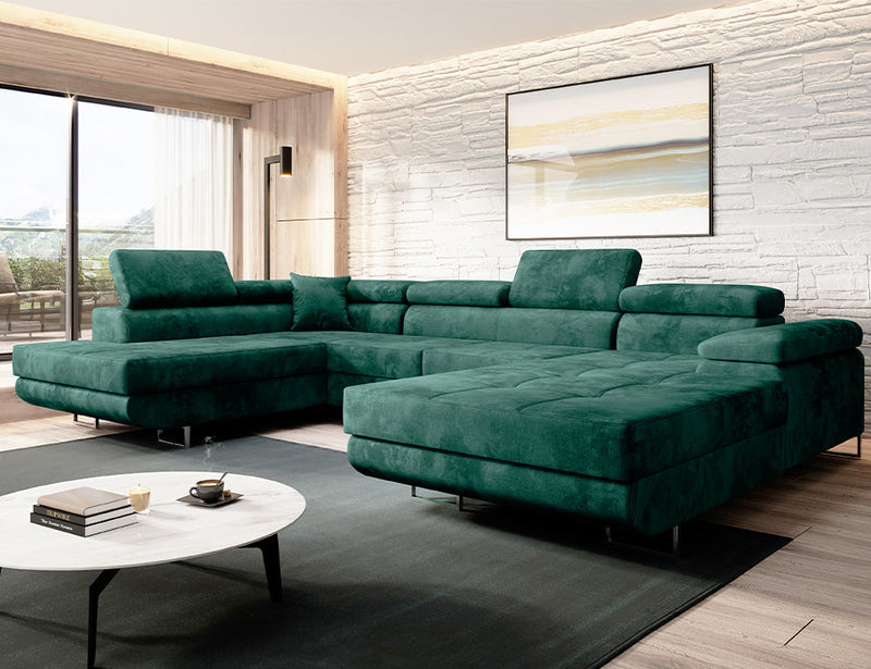 Luxurious velvet VARBERG corner sofa in U-shape with fold-out design and headrests.