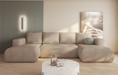 U-shaped corner sofa with boucle fabric in modern living room setting.