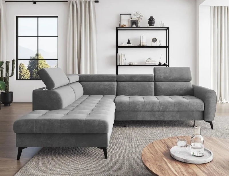 Modern BJORN L corner sofa bed in grey velour Monolith fabric with adjustable headrests in a stylish living room.