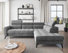 BJORN L corner sofa bed in gray velour with adjustable headrests and quilted seats in a modern living room.