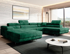 Luxurious green velvet VARBERG Corner Sofa U-shape with headrests in a modern living room setting.