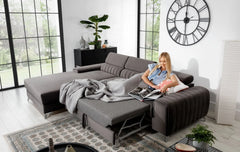 Grayson Corner sofa bed with adjustable headrests and contoured backrest in modern living room setting.