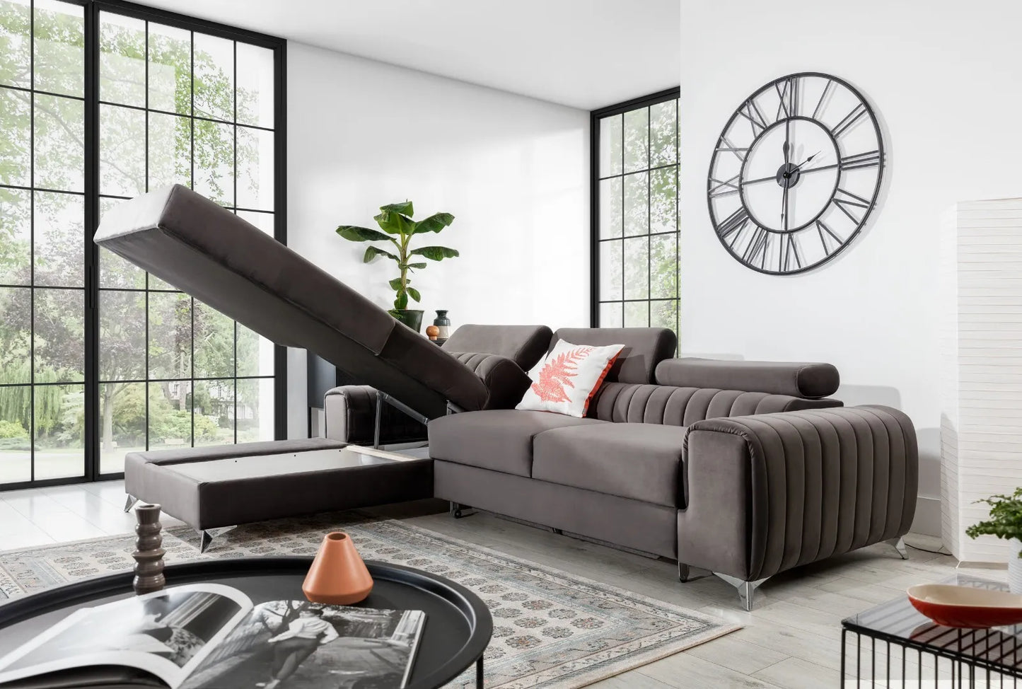 Grayson Corner sofa bed with adjustable headrests, showcasing luxury and functionality in a modern living room.