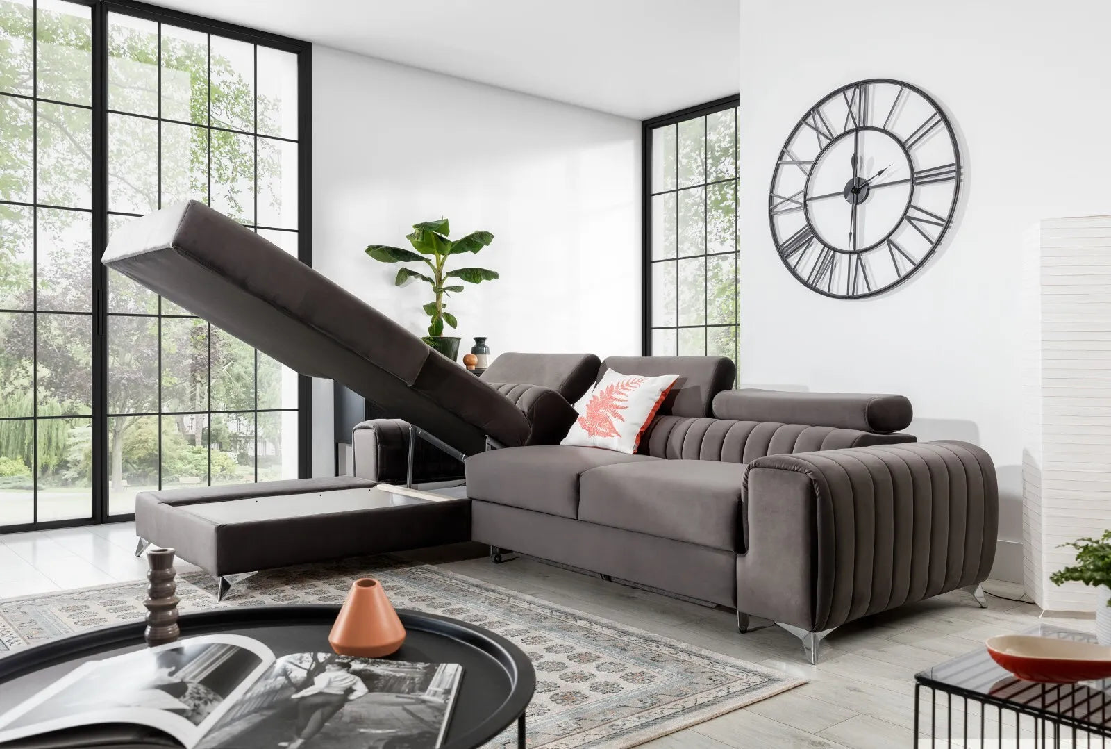 Grayson Corner sofa bed with adjustable headrests, showcasing luxury and functionality in a modern living room.