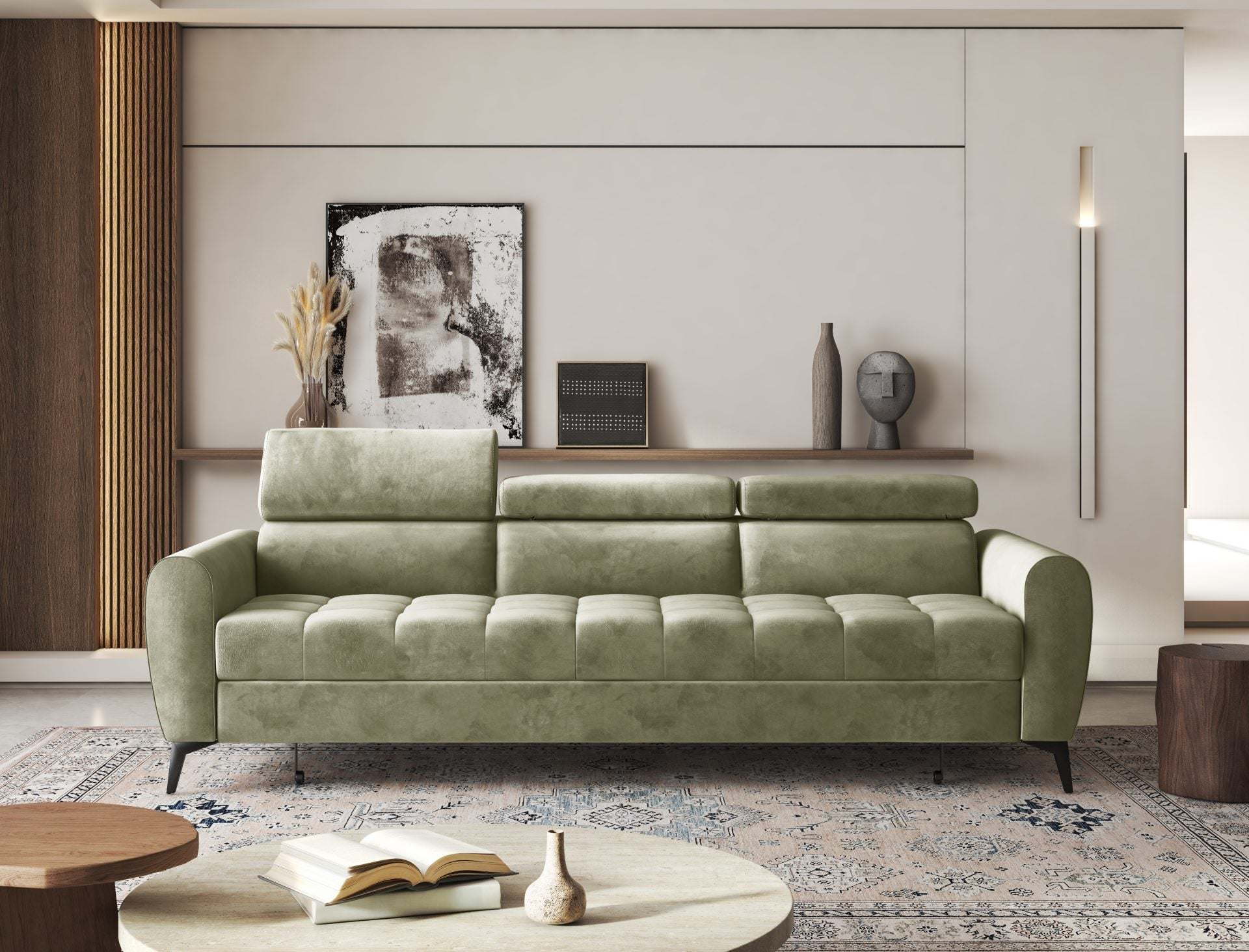 BJORN sofa bed with adjustable headrests in a modern living room.